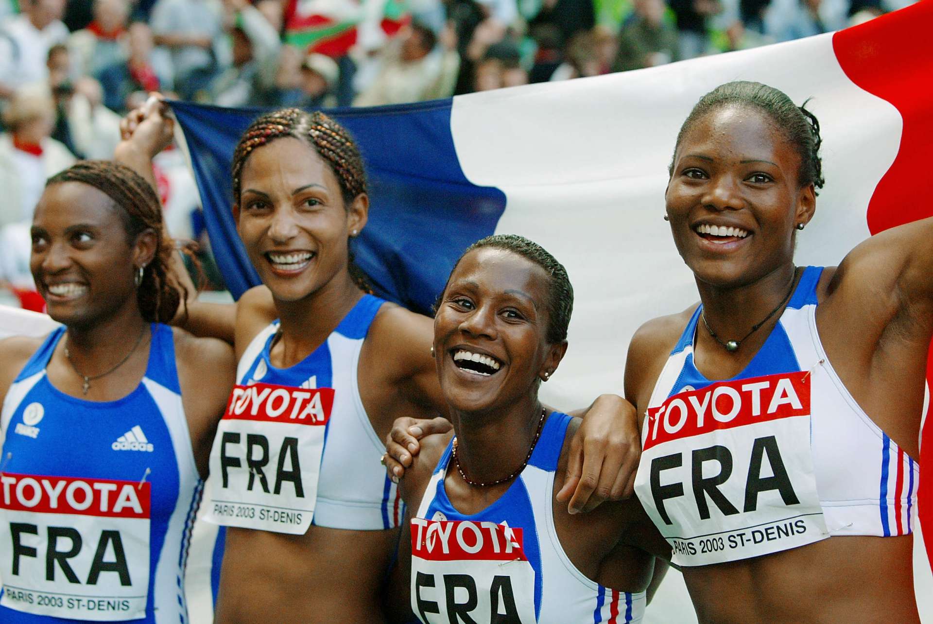 Christine Arron_Les relayeuses françaises 4X100 mètres lors des championnats du monde de Paris, photographie, août 2003 (c)AFP